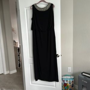 Black gown full length could be cut to cocktail dress. Very elegant